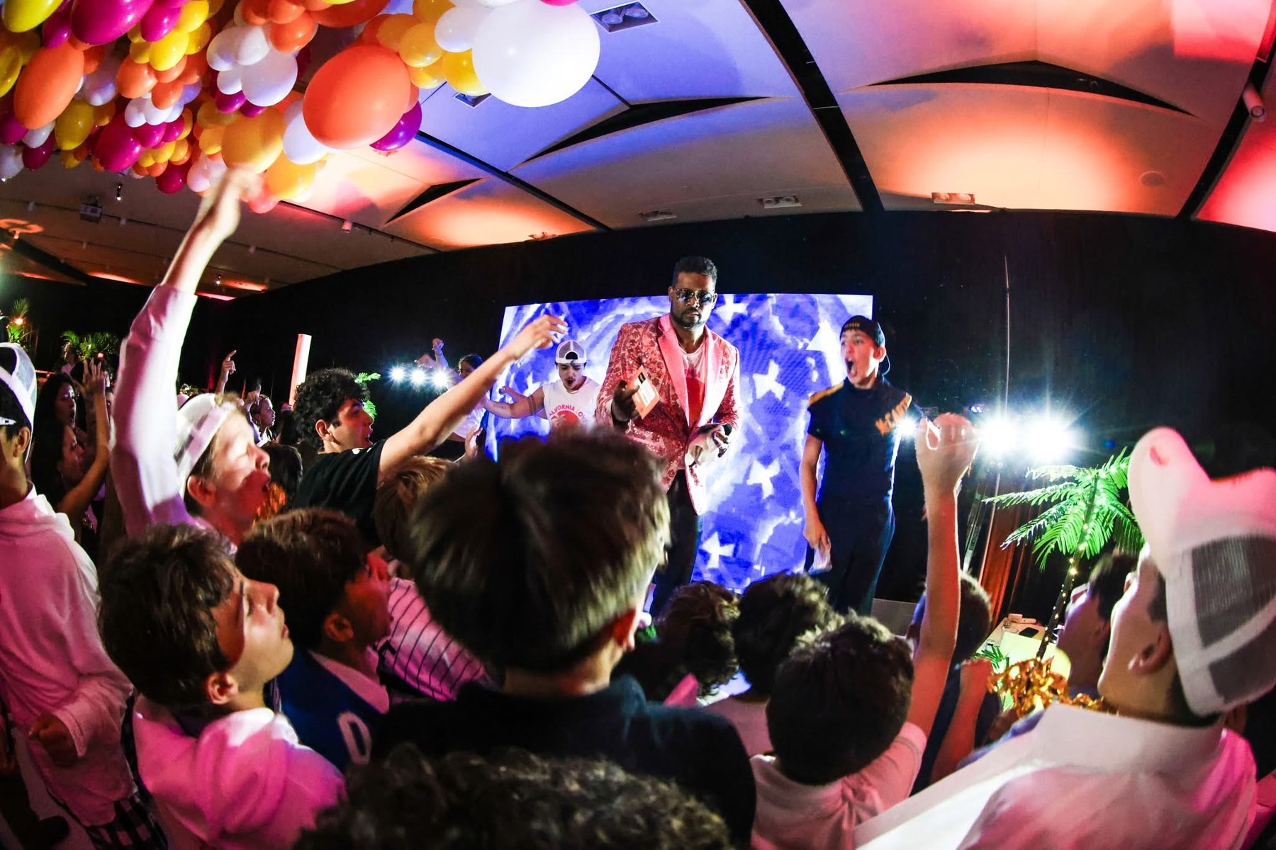 Guests celebrating in front of the LED wall